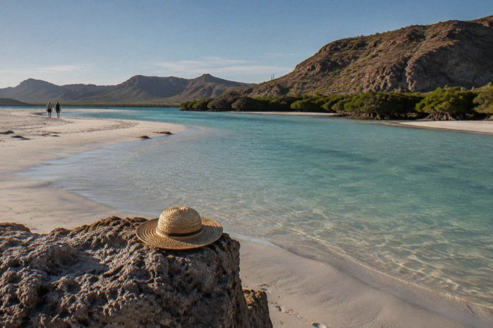 Shallow turquoise cove at Balandra with a sandbar reaching into the bay