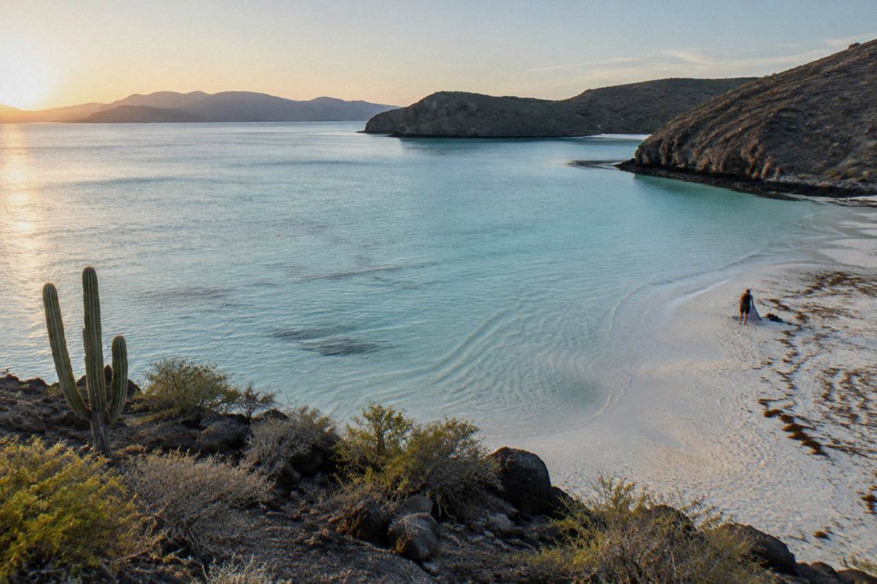 Shallow turquoise water over sand at a protected bay near La Paz